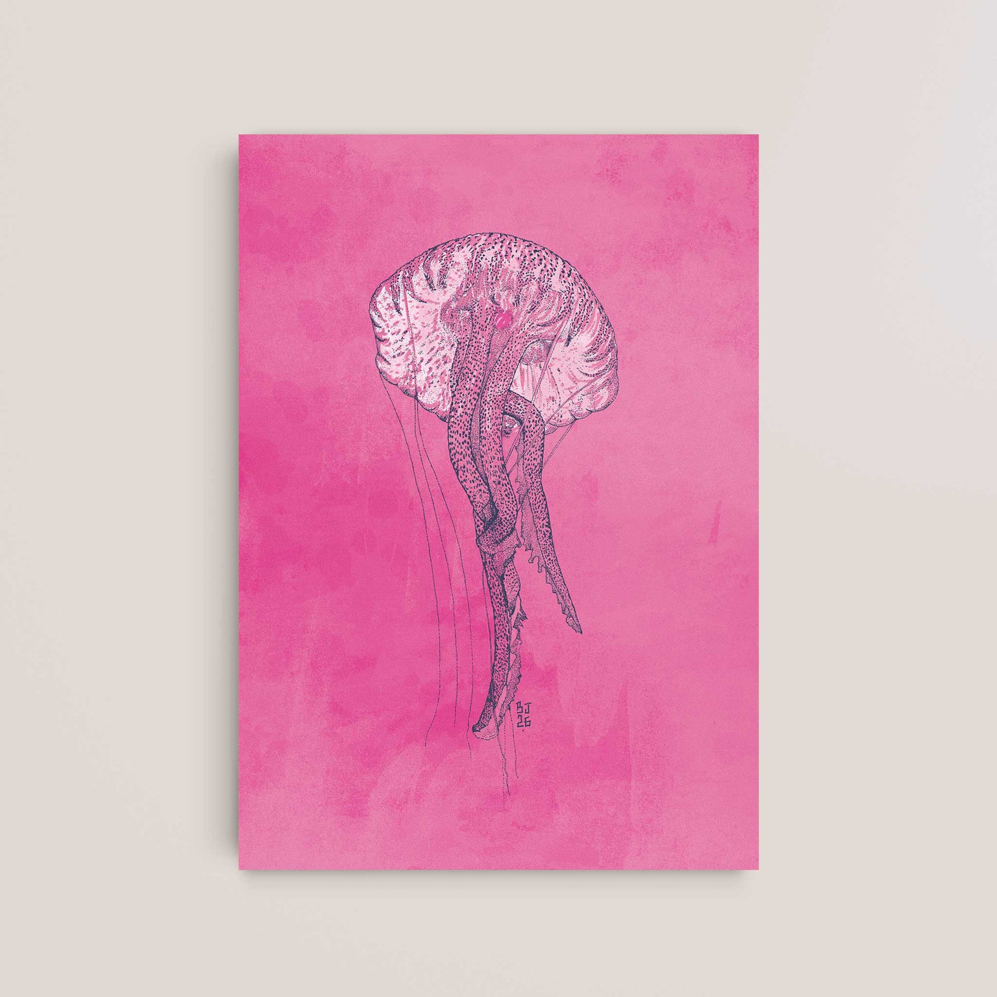 A vertical art print featuring a detailed black ink sketch of a jellyfish on a textured hot pink background, displayed against a neutral beige wall.