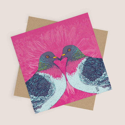 Two illustrated pigeons facing each other on a pink background