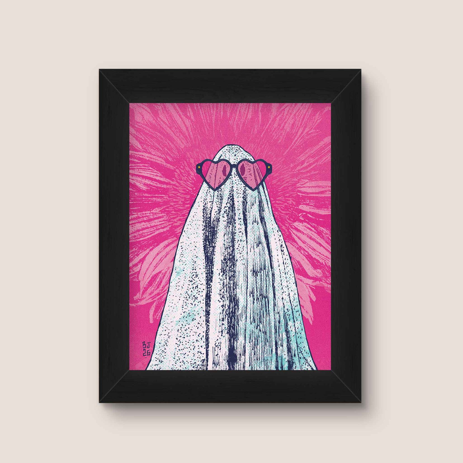 Framed artwork of a ghost wearing heart-shaped sunglasses on a pink background