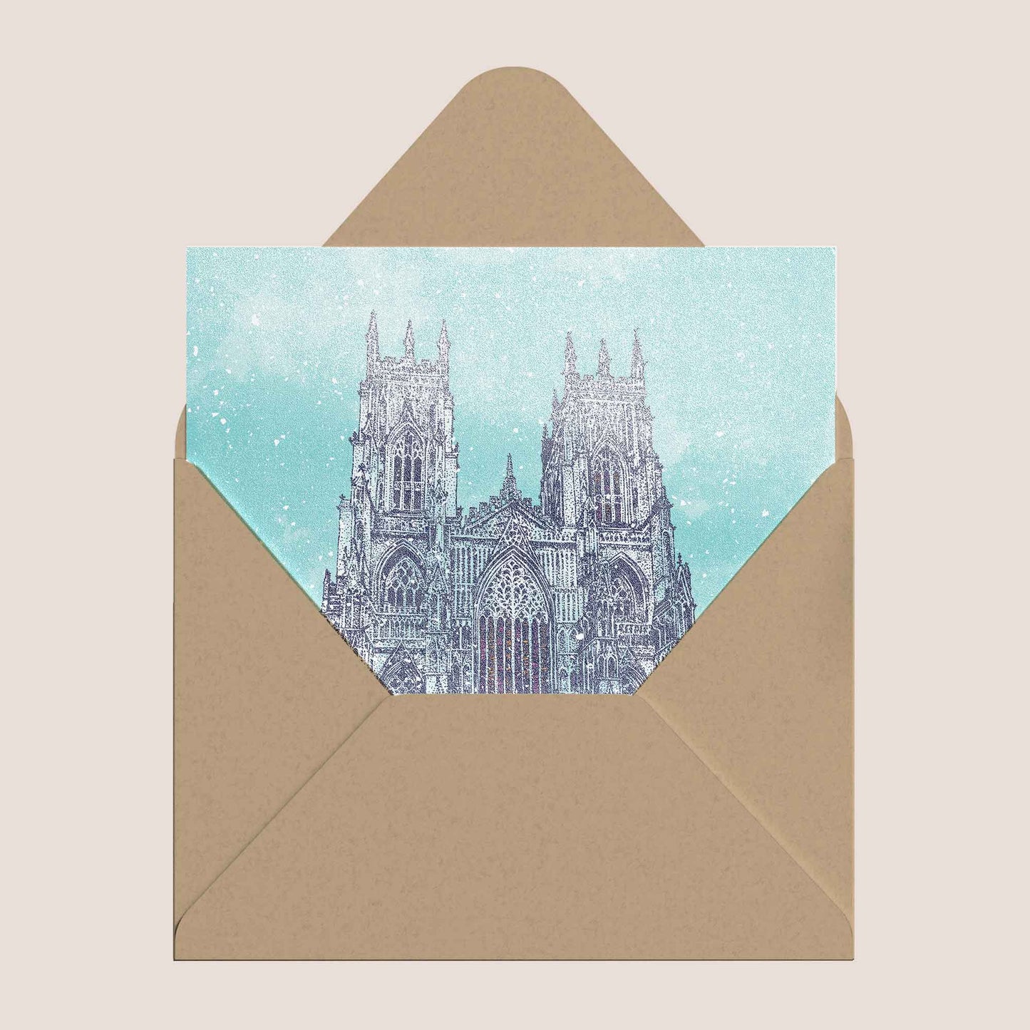 Illustrated Christmas card featuring York Minster in a snowy winter scene inside a kraft envelope